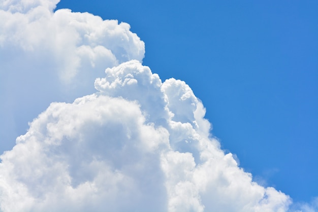 Blue sky background with clouds .