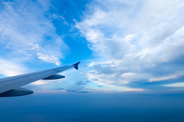 Blue sky background with tiny clouds