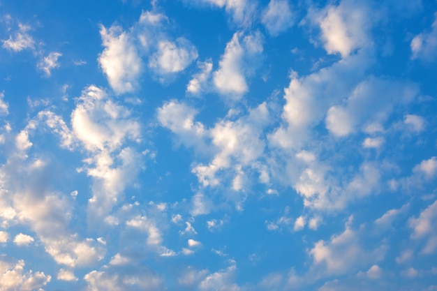 blue sky background with white clouds sunset.