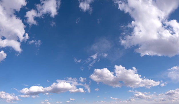 Blue sky background with white clouds