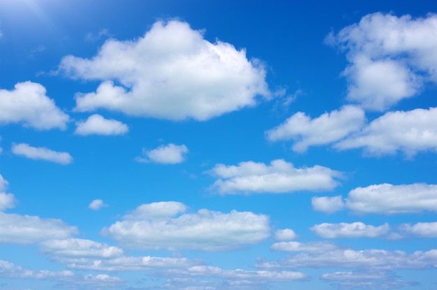 Blue sky background with white clouds