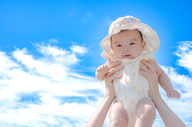 blue sky and a cute baby