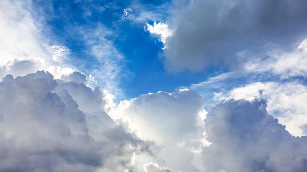 Blue sky and fluffy white clouds