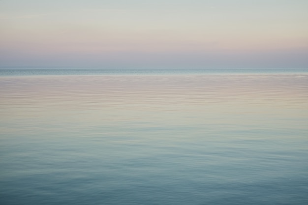 Blue sky landscape without clouds spreading on the sea in the late winter