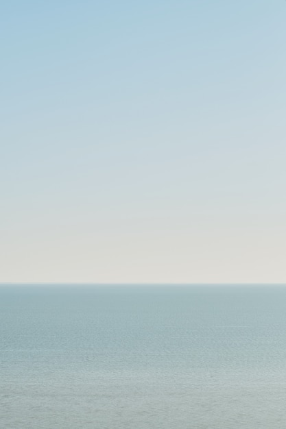 Blue sky landscape without clouds spreading on the sea in the late winter