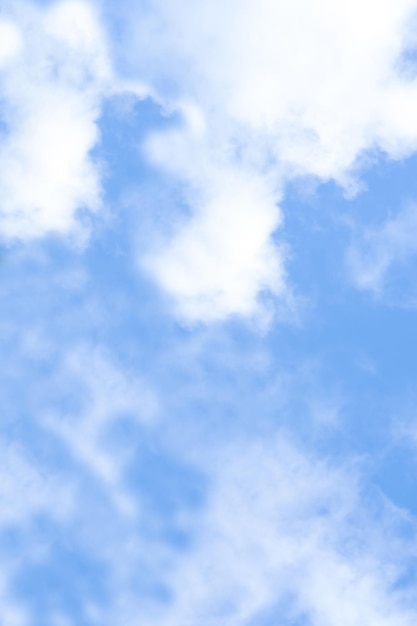 Blue sky and white fluffy cloud on sunny day Vertical Natural for Spring or summer background