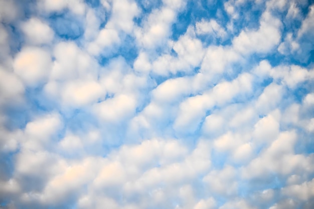 The blue sky and white fluffy clouds