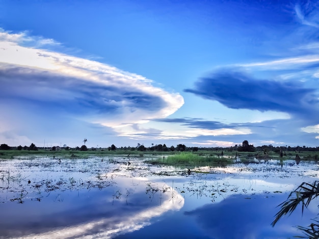 a blue sky with clouds and a blue sky with a few clouds