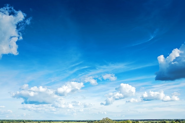 Blue sky with cumulus clouds close up