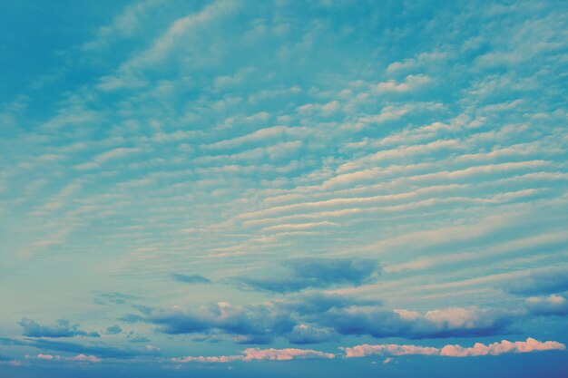 Blue sky with fluffy clouds Sky texture abstract nature background