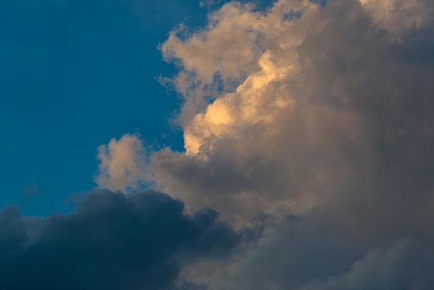 Blue sky with gray and red clouds