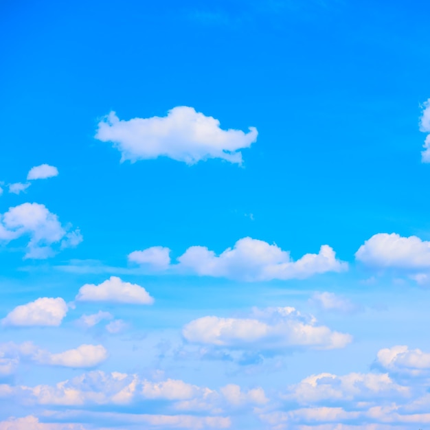 Blue sky with many white heap clouds, may be used as background