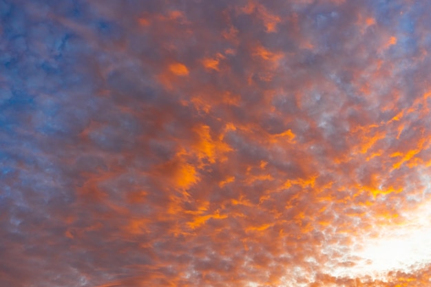 Blue sky with orange clouds on sunset