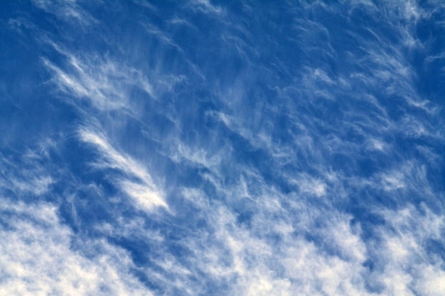 Blue sky with spindrift clouds