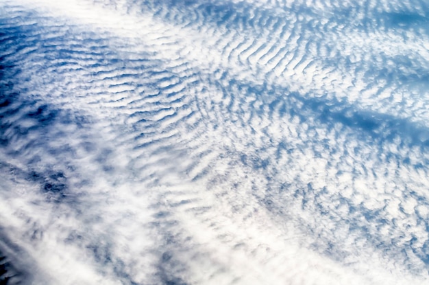 Blue Sky with Stripes Clouds Texture with copy space