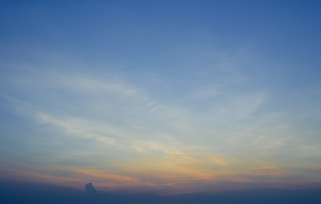 Blue sky with tiny clouds