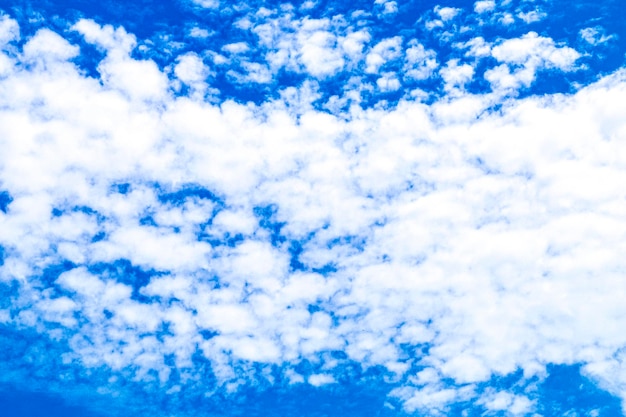 A blue sky with white clouds and a blue sky.