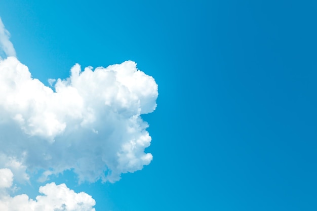 Blue sky with white clouds closeup