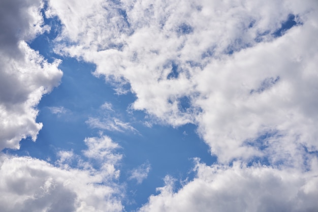 Blue sky with white fluffy cloud