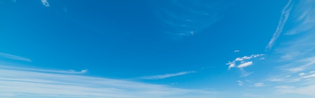 Blue sky with white soft clouds