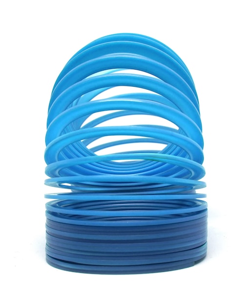 Blue slinky toy Isolated On White Background