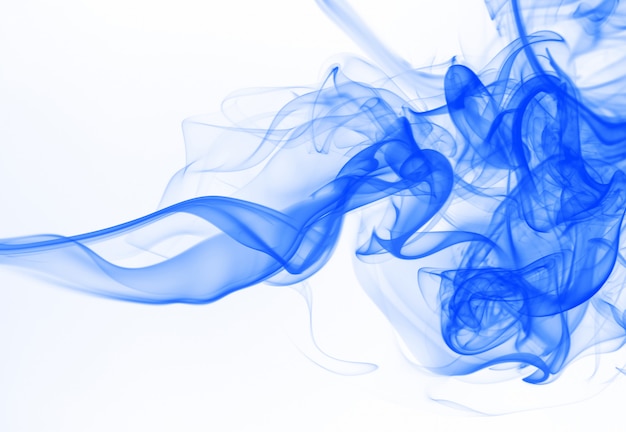 Blue smoke abstract on white background. ink water on white