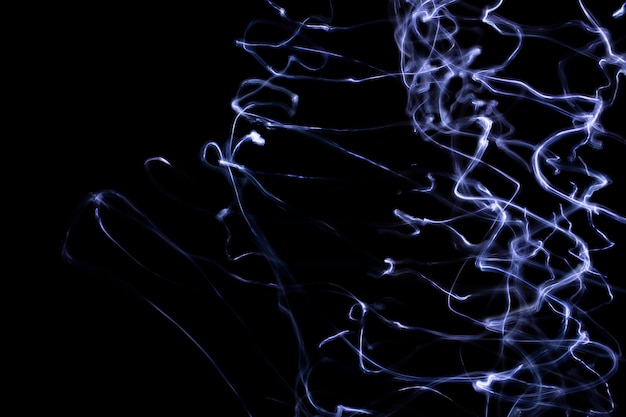 Blue smoke on a black background