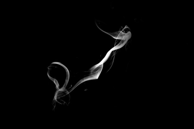 Blue smoke isolated on a black background. template for design