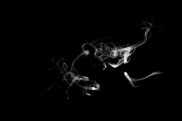 Blue smoke isolated on a black background. template for design