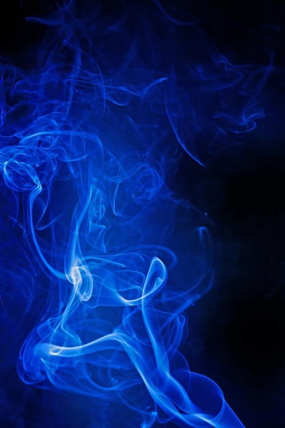 Blue smoke motion on black background