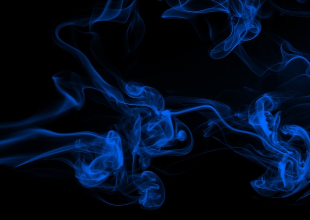 Blue smoke movement abstract on black background for design