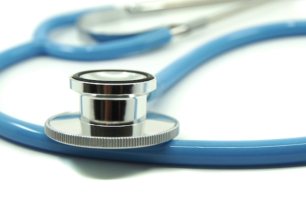 Blue stethoscope on white surface. Medical devices For treatment. Healthcare concept.