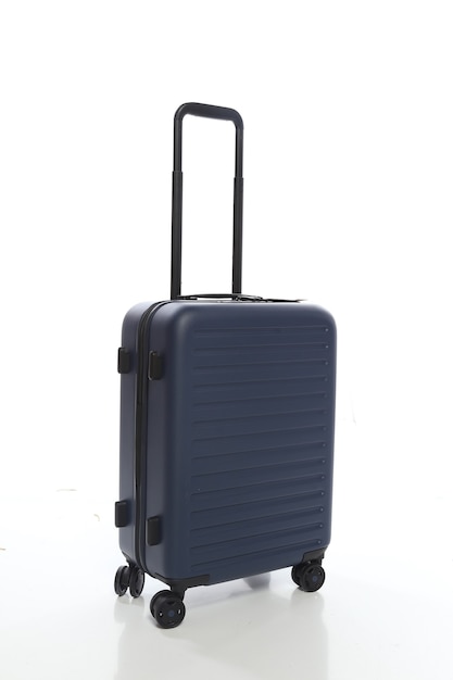 Blue 
suitcase on white background