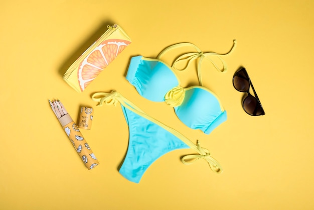 blue swimsuit on a yellow background