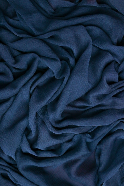 Blue toned abstract textile texture background