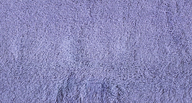 Blue towel surface texture background Rough blue towel texture