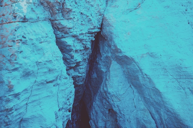 Blue vintage rocky background Rock cleft in Rosh HaNikra Israel