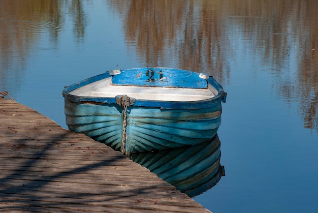 Blue walkboat on the river Tormes Salamanca