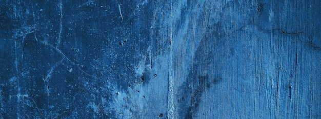 Blue wall backgroundconcrete wall plastered blue scratch backgroundgrunge texture