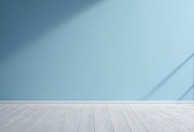 a blue wall with a light blue background and a wooden floor