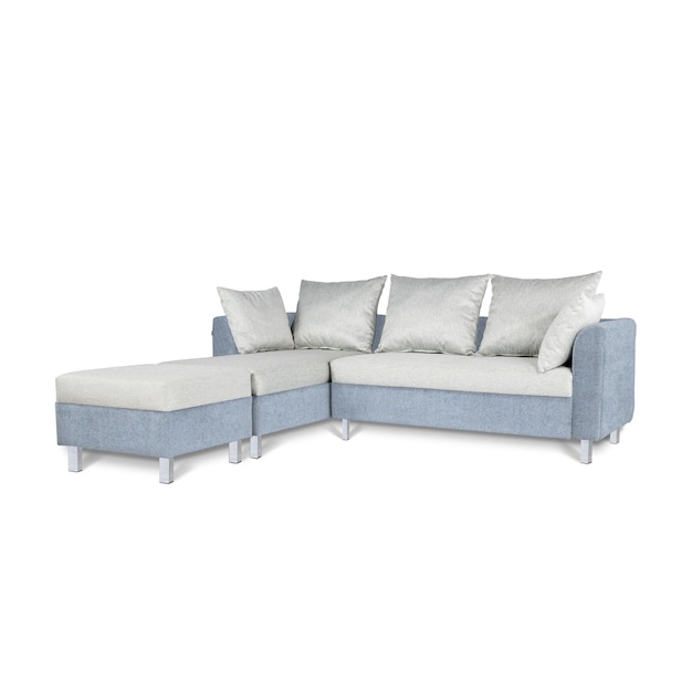 A blue and white couch with a white pillow on it.