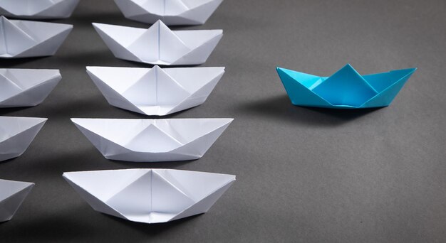 Blue and white paper boats Business concept