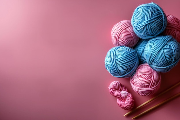 Photo blue yarn ball on pastel pink background top view random technique for knitting and crocheting hi