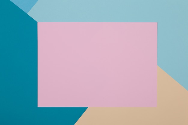 Blue, yellow and pink background, colored paper geometrically divides into zones