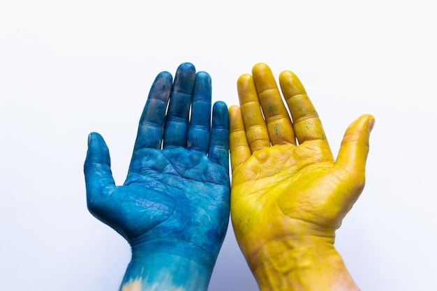 Blue and yellow ukrainian hands isolated symbolic hands