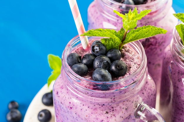 Photo blueberrie smoothie made with fresh organic blueberries and plain yogurt.