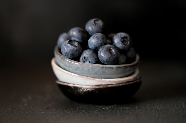 blueberry berries in a dark key.