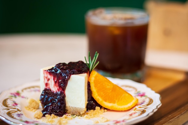 Blueberry cheesecake and americano coffee in the cafe