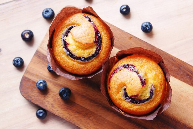 Blueberry muffins on table with copy space