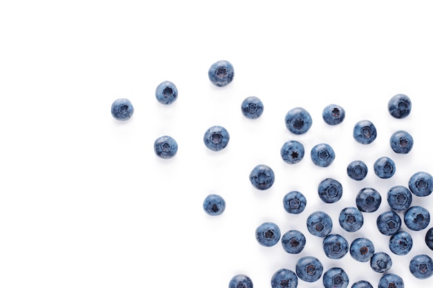 Blueberry scatter on white isolated background.